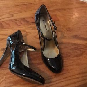 Nine West black patent heel 101/2M. Runs small.